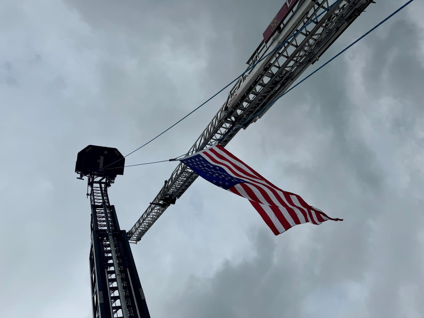 Denton ladder truck flying an American flag